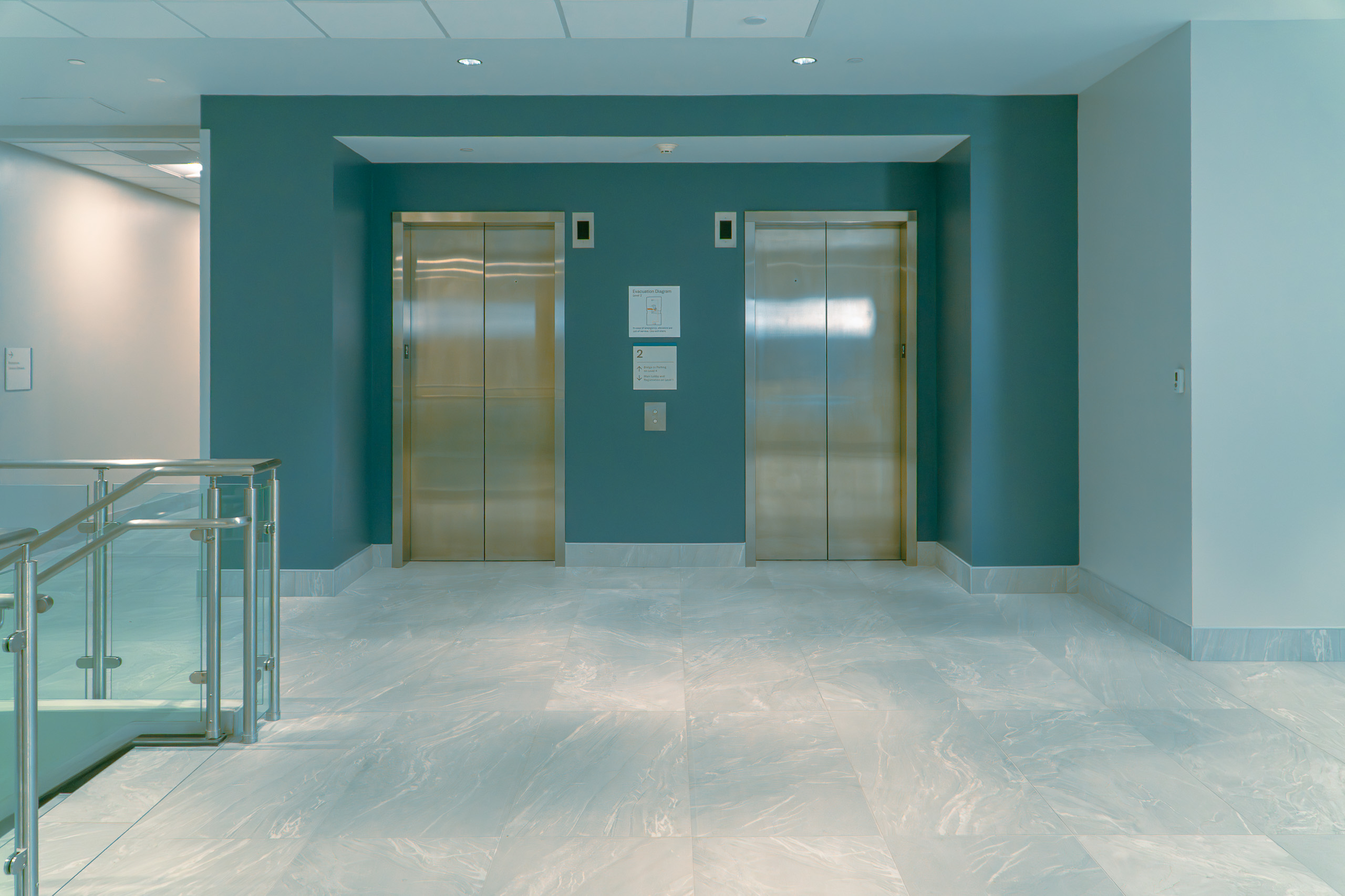 AIDM second-floor stairs and elevator