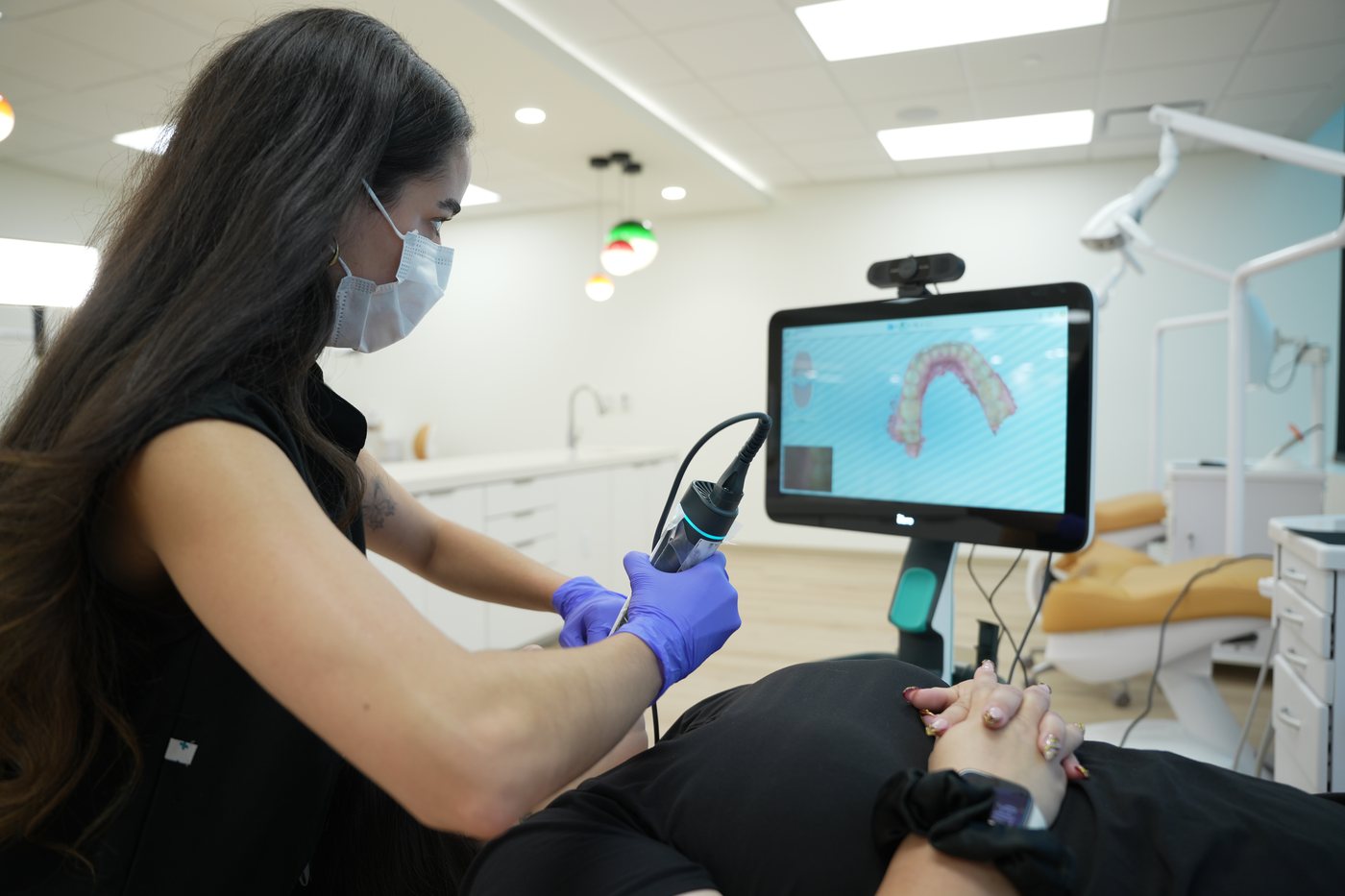 A team member taking a digital scan